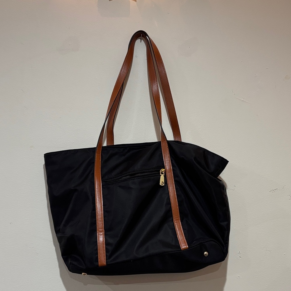 Elegant Black Tote Bag with Brown Straps
